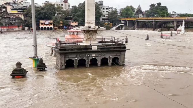 Temples got partially submerged in the Godavari river