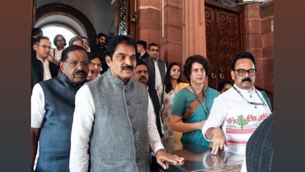 MPs file out of Parliament after it was adjourned for the day