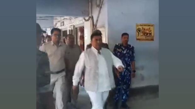 Shajahan Sheikh arrives at a police station
