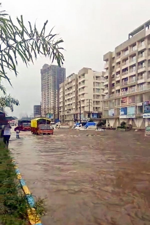 A flooded road in Shilphata, Thane district