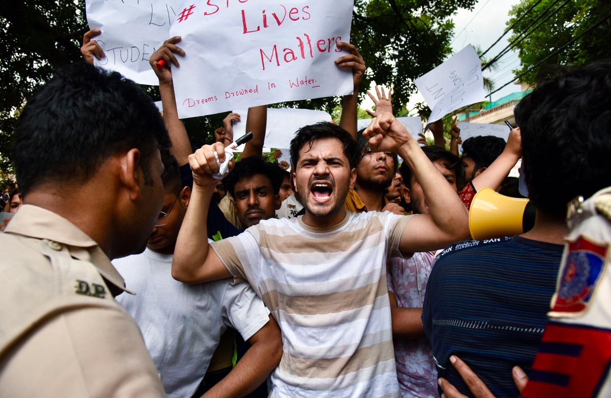 Students stage a protest outside the Rao IAS Study Centre