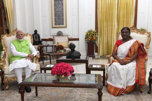 Caretaker PM Narendra Modi with President Murmu