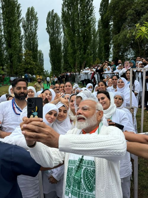 Modi takes a selfie after the yoga session in Srinagar