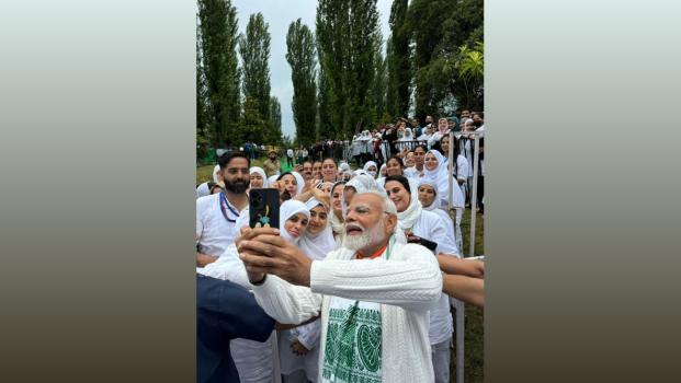Modi takes a selfie after the yoga session in Srinagar