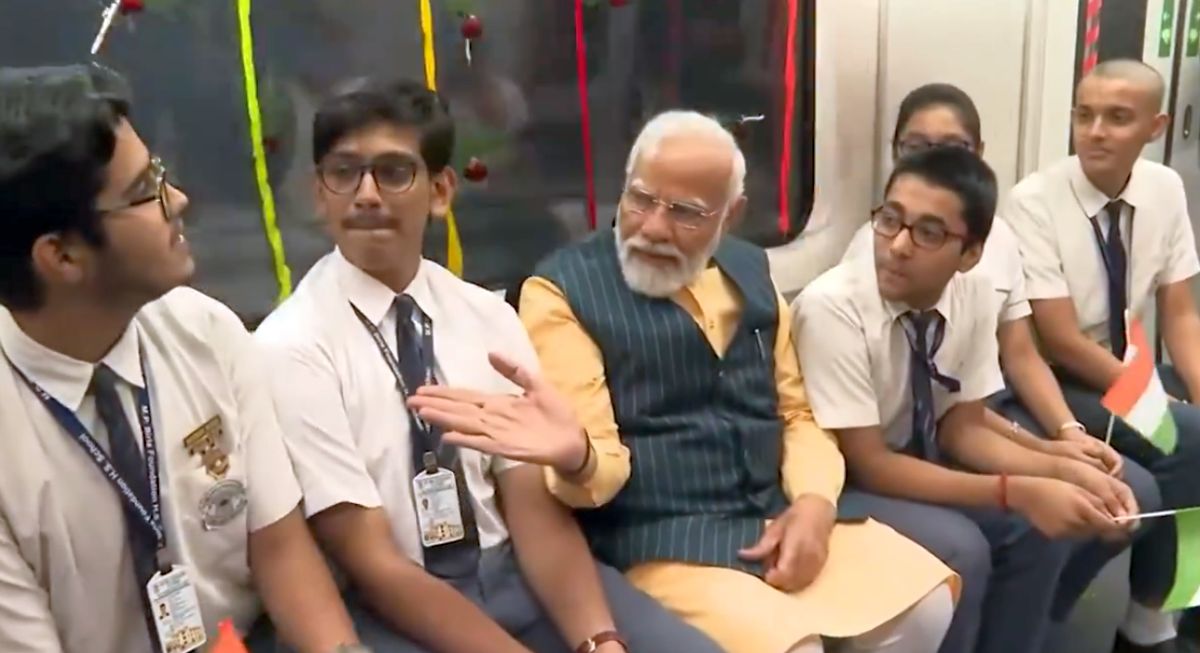 Modi takes a ride in the underwater metro with school students