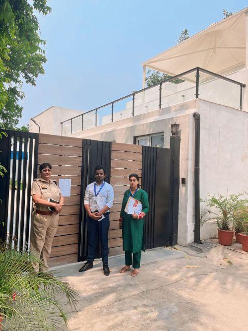 NCW officers outside Bibhav Kumar's residence