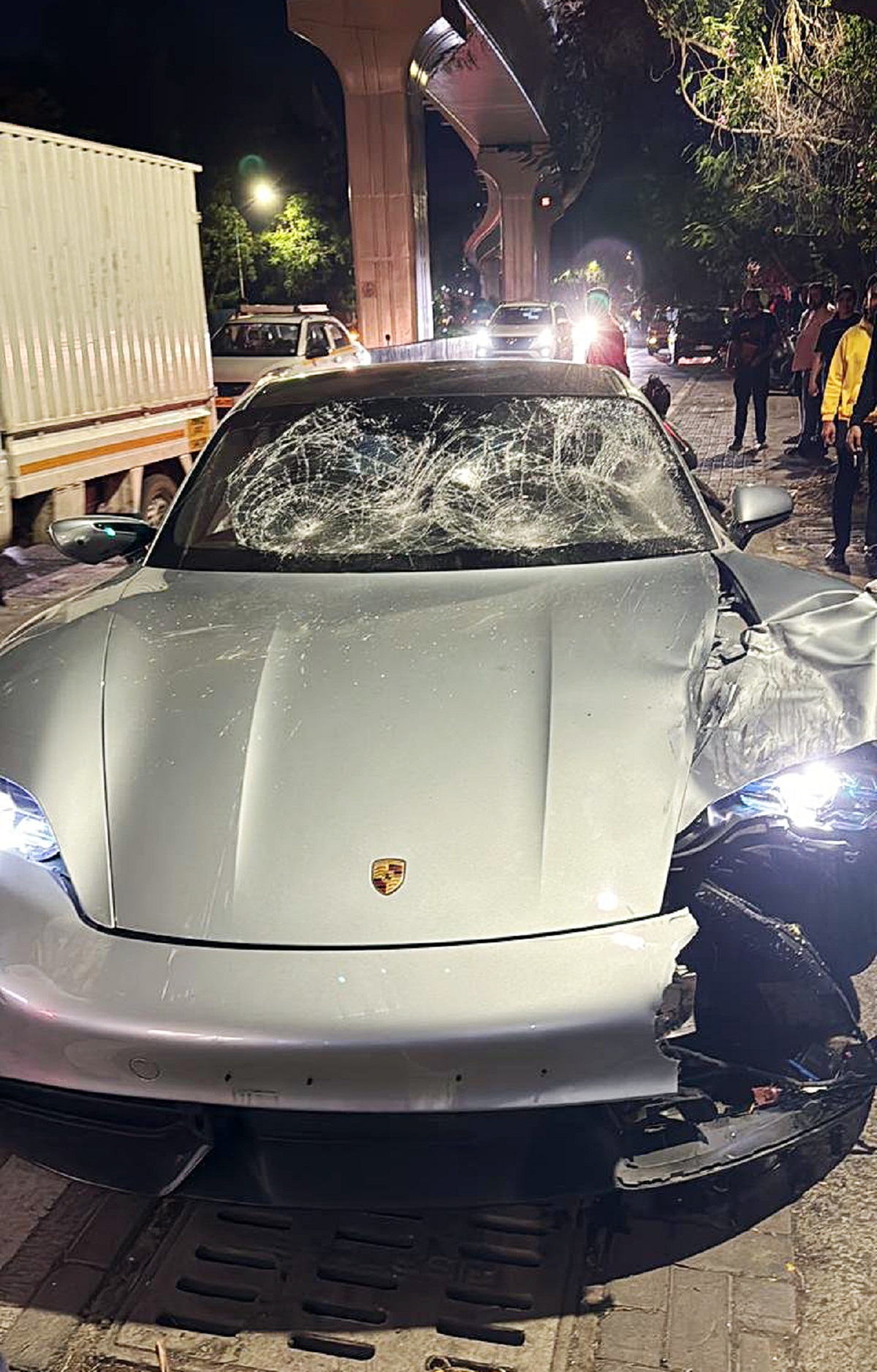 The banged up Porsche after the accident