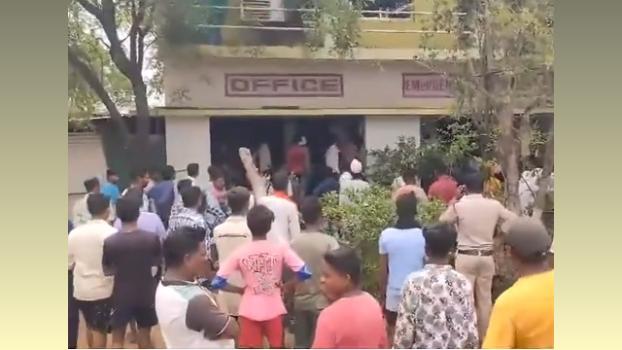 Police and local people throng outside the factory after blast/ANI on X