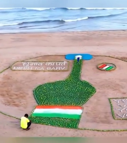 Sand artist Sudarsan Pattnaik's sculpture with 500-kg mangoes on voting awareness/Courtesy X