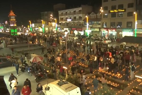 Locals and tourists light diyas to mark Diwali celebrations at Lal Chowk, Srinagar on Thursday/ANI on X