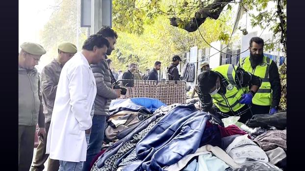 The forensic team examines the site of the grenade attack in Srinagar/ANI Photo