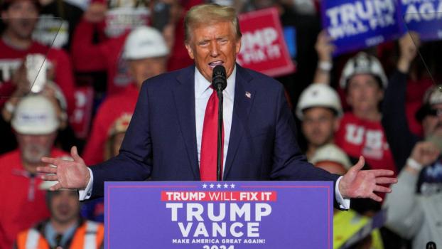 Republican presidential nominee Donald J Trump speaks during a campaign rally in Pittsburgh, Pennsylvania, November 4, 2024/Jeenah Moon/Reuters