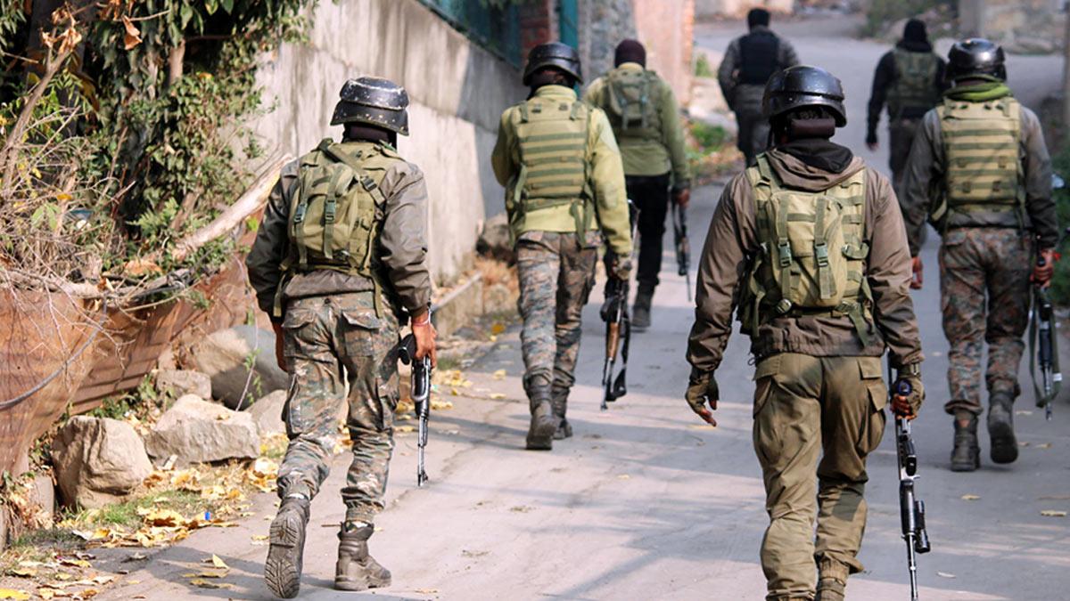 Security personnel conduct a search operation in Zabarwan