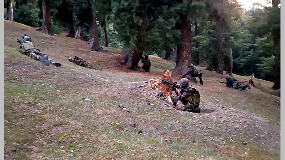 Security personnel conduct a search operation in Baramulla