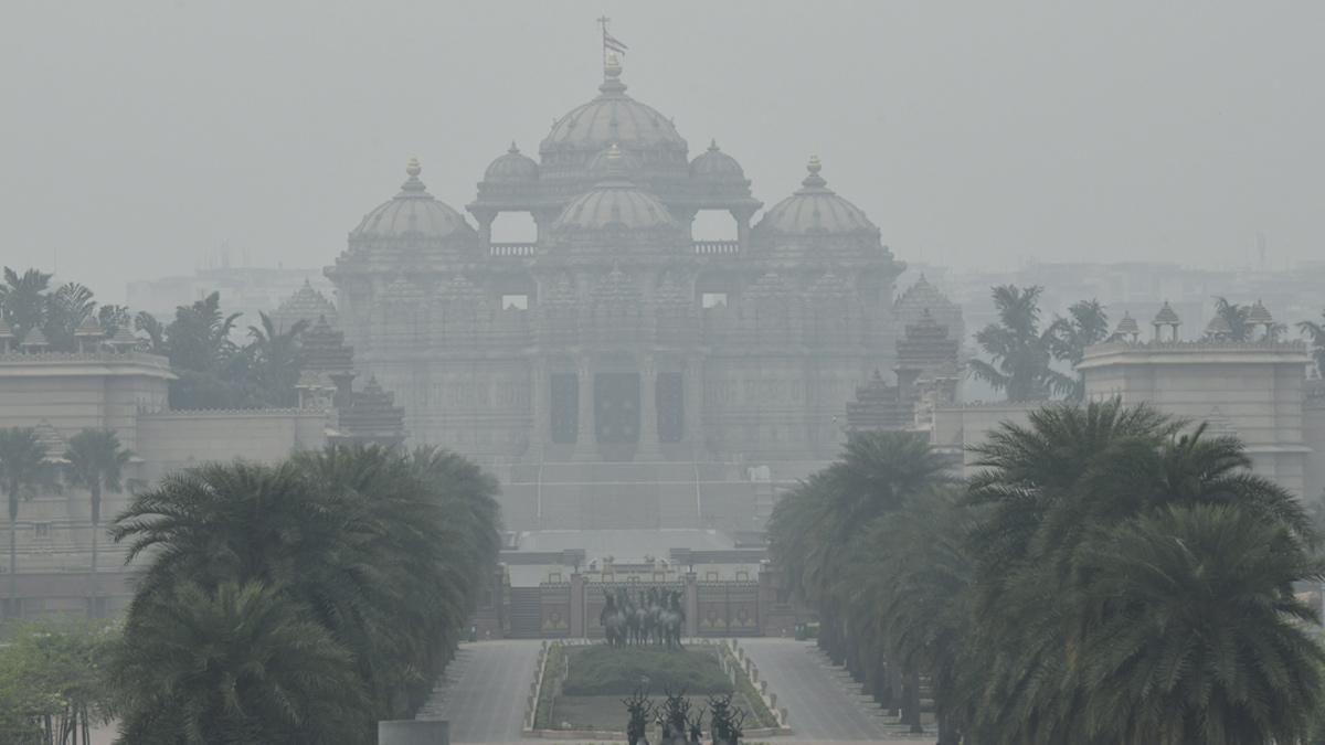 layer of smog engulfs the Akshardham Temple