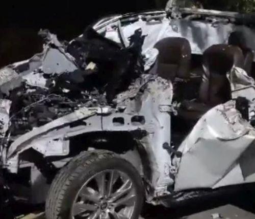 The mangled remains of the car