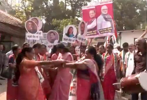 NCP workers dance outside Ajit Pawar's residence