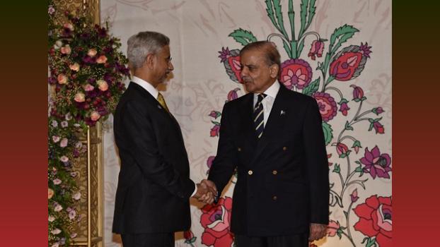 EAM S Jaishankar and Pakistan PM Shehbaz Sharif shake hands in Islamabad/ANI on X