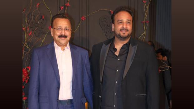 NCP leader Baba Siddique and his son Zeeshan Siddique/File image