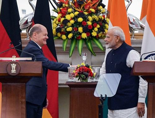 PM Narendra Modi and German Chancellor Olaf Scholz greet each other during a joint press statement in New Delhi on Friday/Rahul Singh/ANI Photo