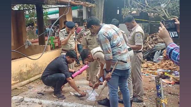 Police and FSL officials collect at the fireworks accident site in Kerala/ANI Photo