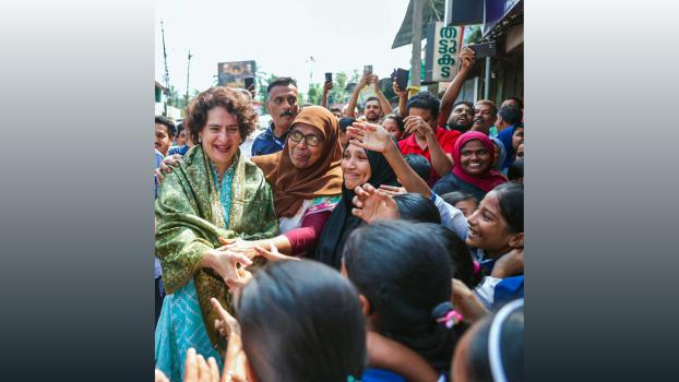 Congress leader Priyanka Gandhi Vadra is mobbed when she arrives to address an election meeting in Wayanad, October 29, 2024/ANI Photo