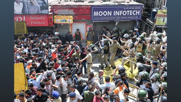 Police try to stop protestors during protest against a mosque in Sanjauli, Shimla/ANI Photo