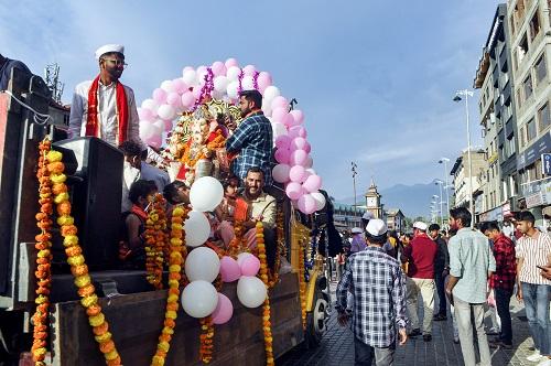 An idol of Lord Ganesha being taken for immersion by devotees during the Ganesh Chaturthi festival, in Srinagar/ANI Photo