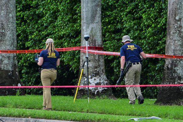 Reuters/Giorgio Viera. The FBI at the golf club