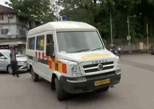 The ambulance carrying the body of the accused