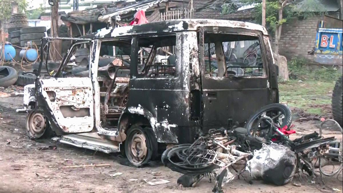 Charred remains of vehicles torched during protest against the Waqf Act in Murshidabad.