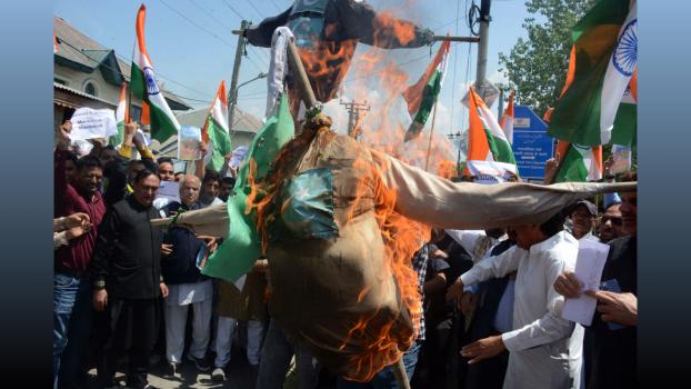 Effigies of Pakistan being burnt in Srinagar. Pic: Umar Ganie