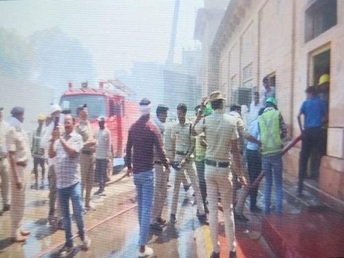 Fire officials in action after fire at Gwalior railway station/ANI Photo