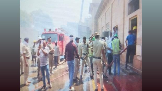 Fire officials in action after fire at Gwalior railway station/ANI Photo