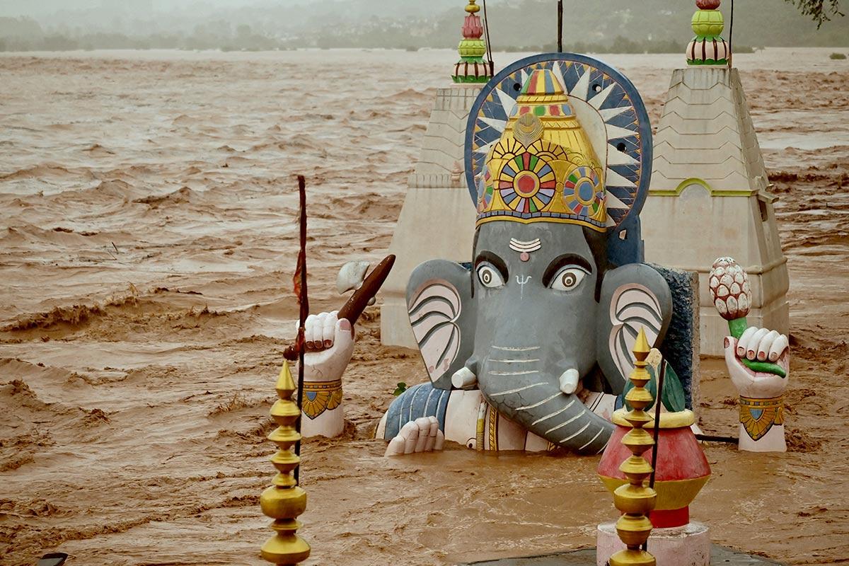 Overflowing Tawi River floods Ganesh temple in Jammu