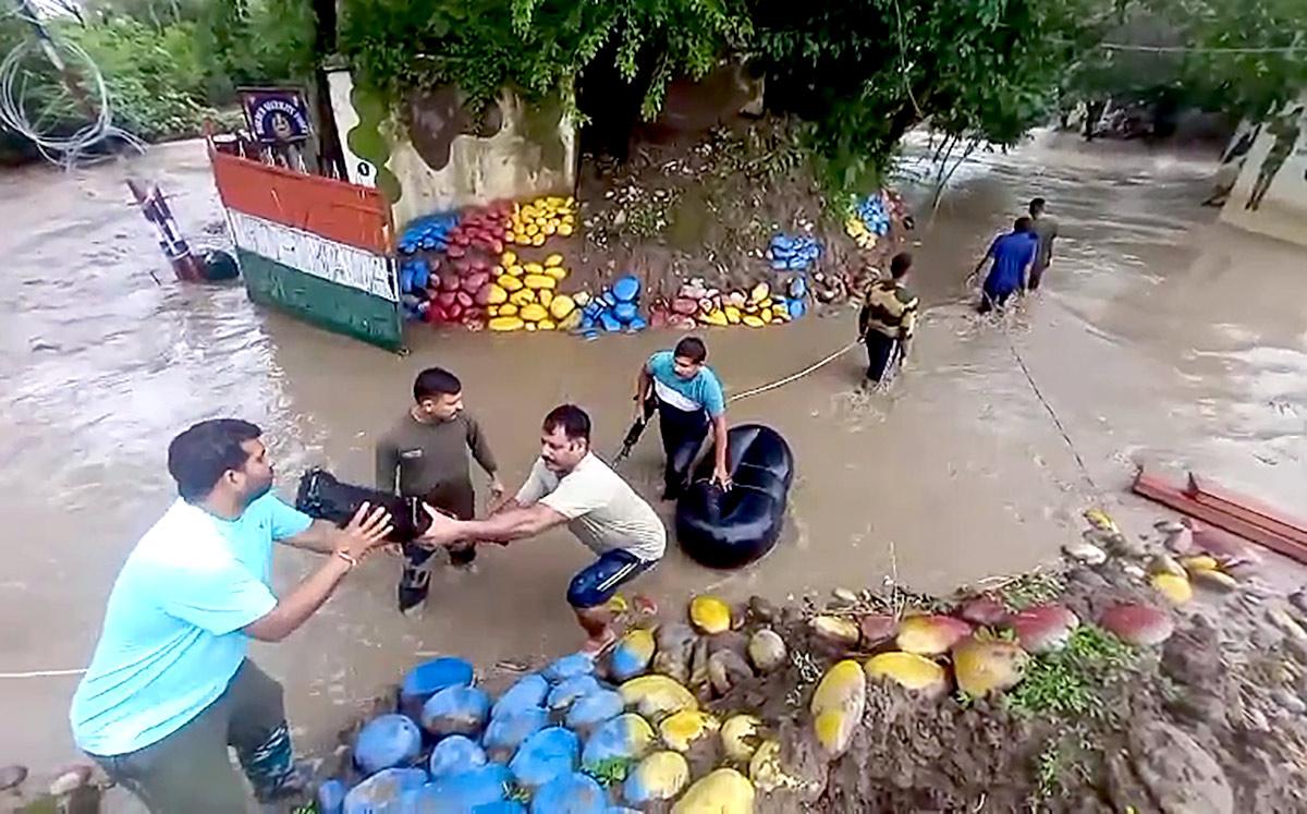 Security forces conduct rescue operations in Akhnoor flood zones
