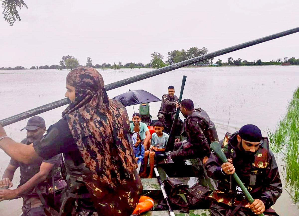 Security personnel rescue people from flood-affected Makwal Jammu