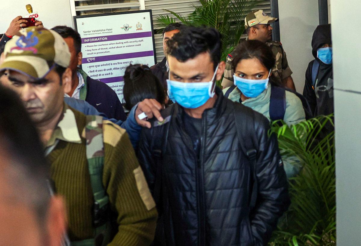 Indian immigrants who allegedly illegally migrated to the US arrive at Sardar Vallabhbhai Patel International Airport