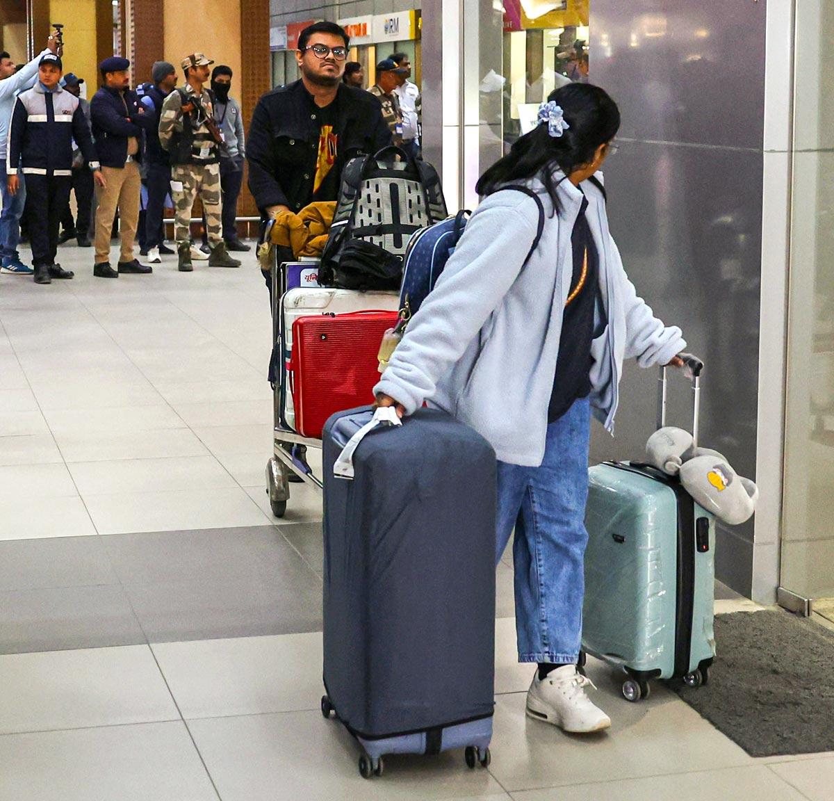 Indian immigrants who allegedly illegally migrated to the US arrive at Sardar Vallabhbhai Patel International Airport