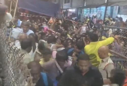 Cops struggle to control the huge number of devotees at Tirupati./ANI on X