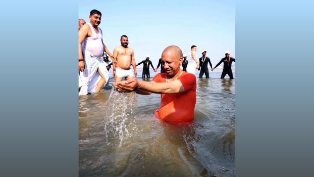 Yogi Adityanath takes the dip