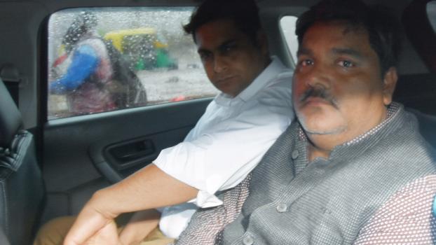 Tahir Hussain (right)