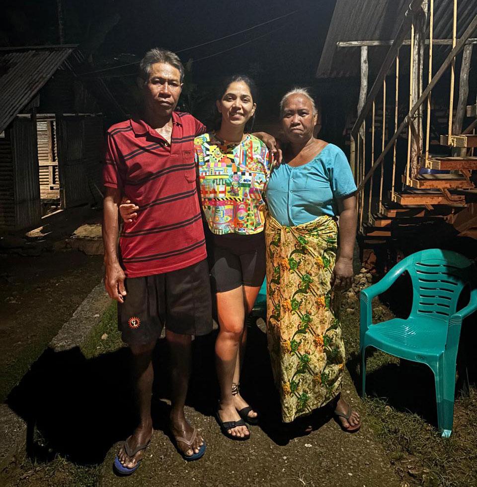 Meghana with Basil and his wife in his village of Kankana