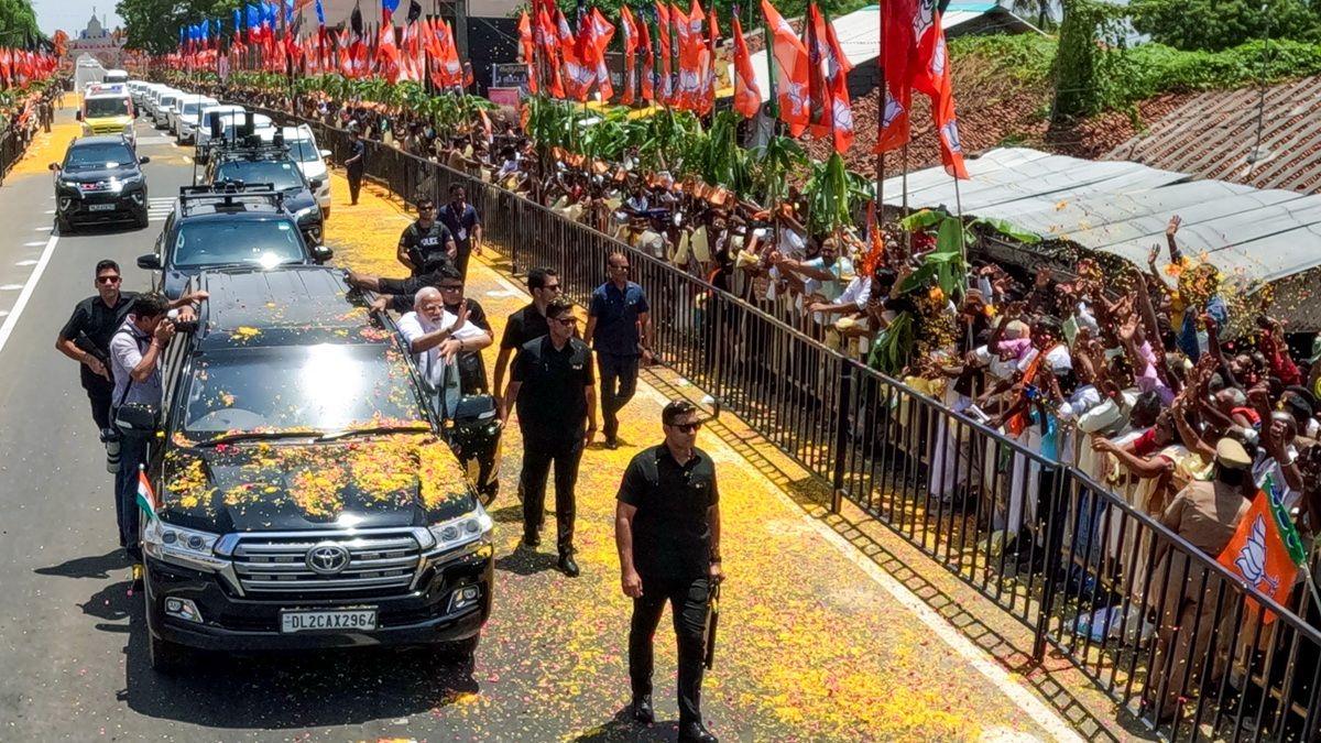 Prime Minister Narendra Modi greets the gathering at Gangaikonda Cholapuram Temple, in Ariyalur on Sunday