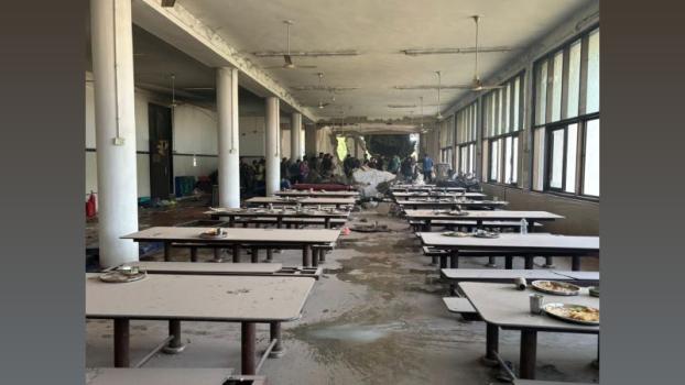 Debris from the plane crash in the canteen of the hostel