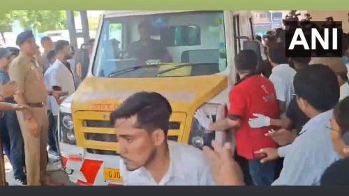 An ambulance carrying the injured arrives at the civil hospital