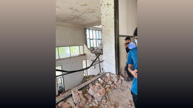 Damaged and broken walls of the BJ Medical College after the plane crashed into the building
