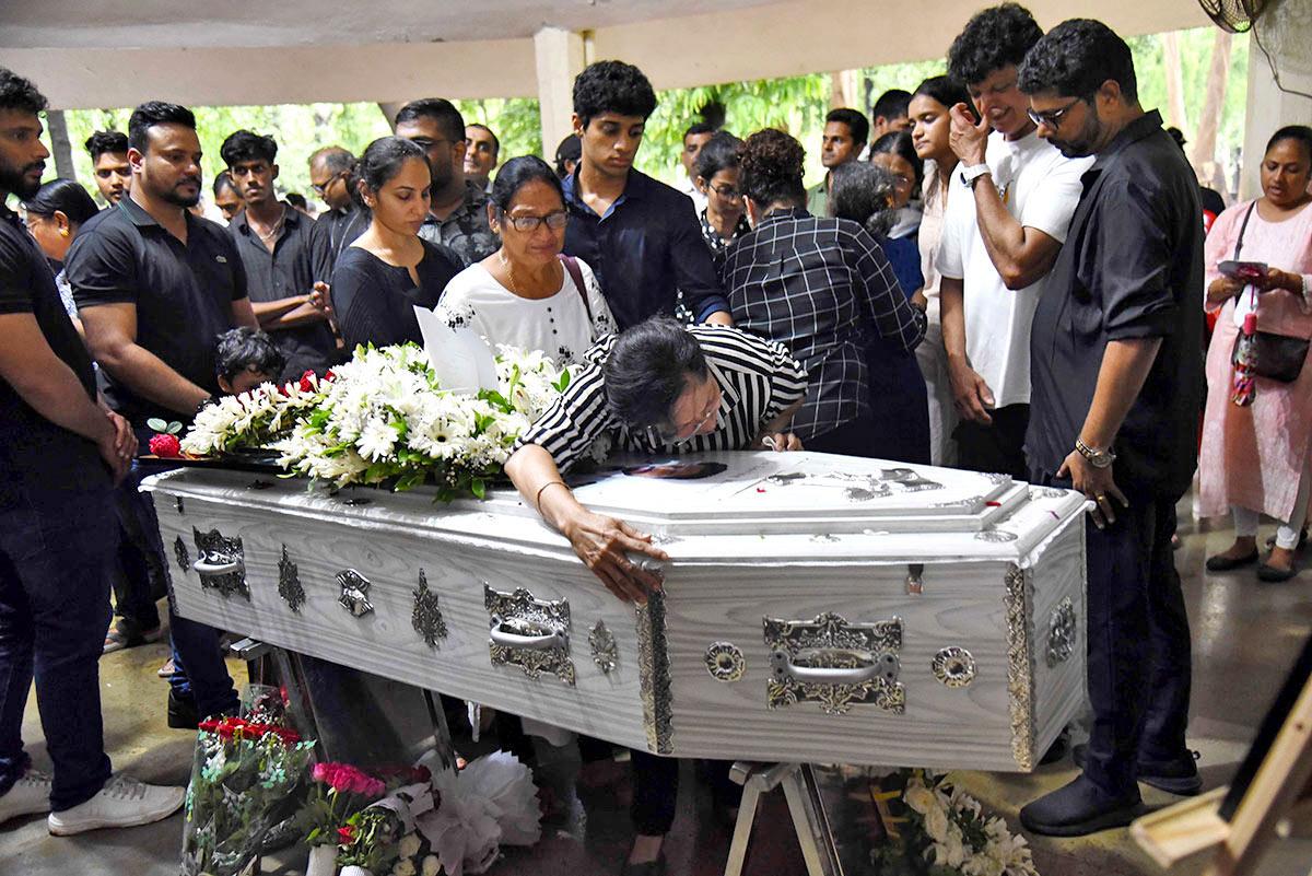 Last rites of AI pilot Kunder, flight attendant Songhare held - Rediff.com  India News