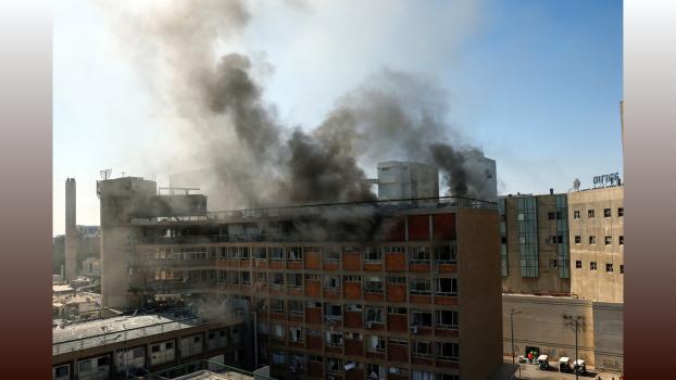 Smoke rises from the Soroka medical centre. Pic: Amir Cohen/Reuters