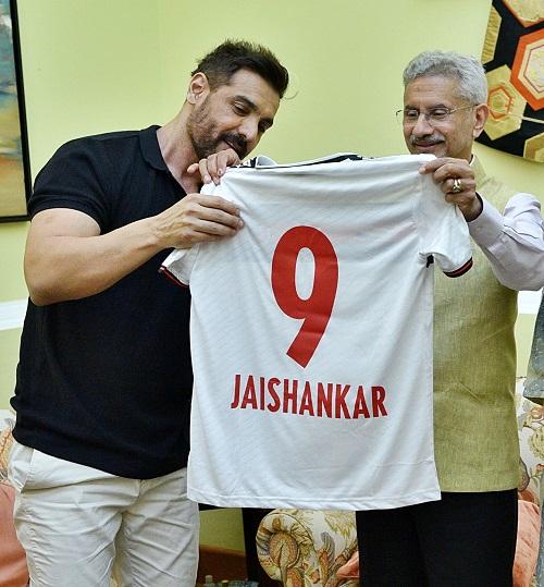 EAM S Jaishankar being presented a jersey by actor John Abraham, in New Delhi/ANI Photo